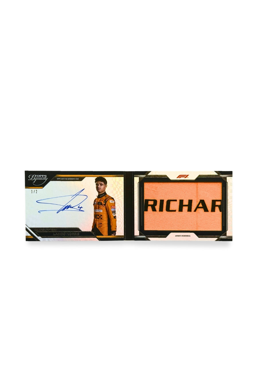 Front of 2024 Topps Dynasty Lando Norris booklet patch autograph card, serial numbered 1 of 2, showing orange memorabilia patch with black “RICHARD” lettering.