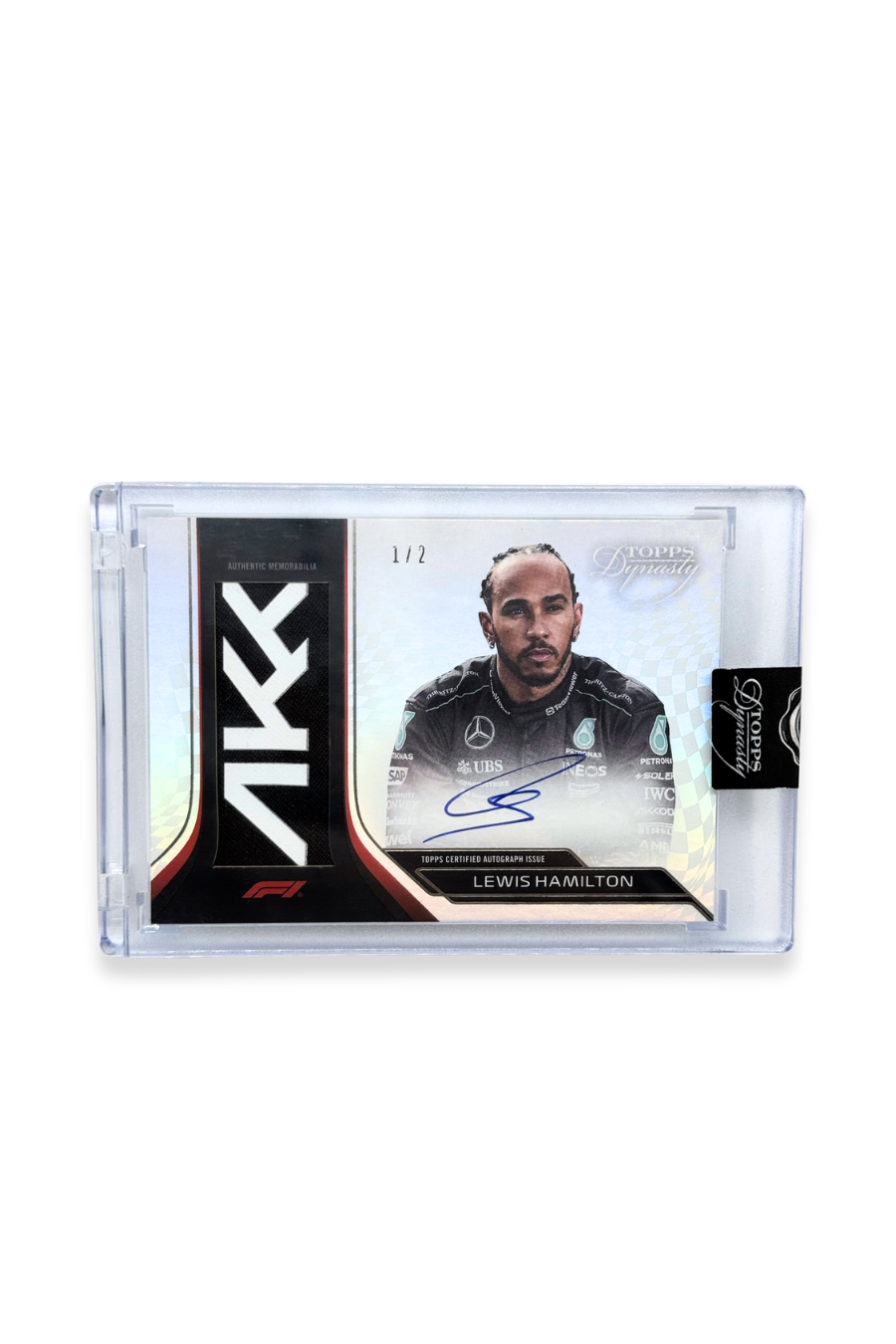 Front of 2024 Topps Dynasty Lewis Hamilton patch autograph card, serial numbered 1 of 2, showing Akkodis logo memorabilia patch.