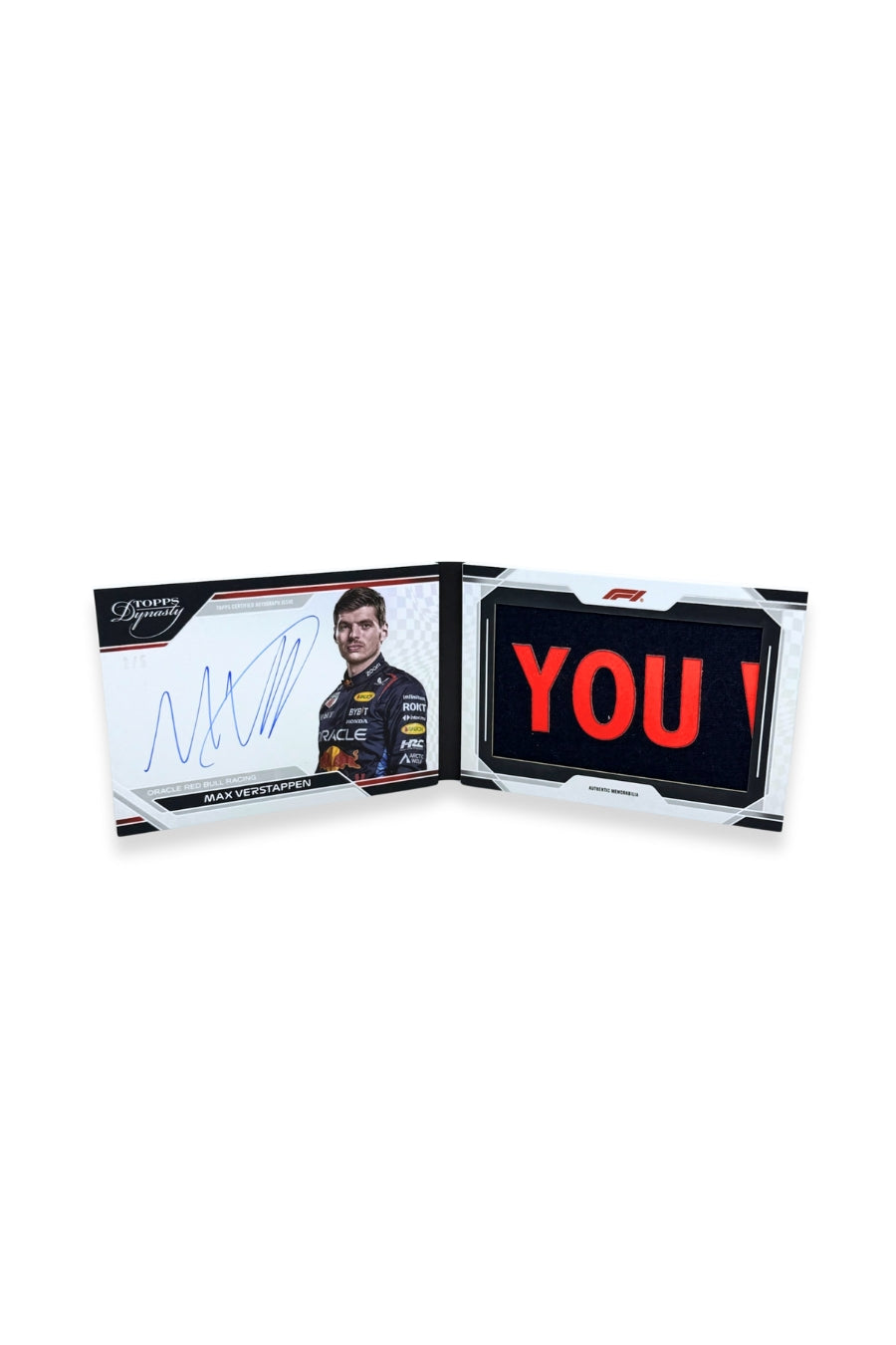 Front of 2024 Topps Dynasty Max Verstappen nameplate patch autograph booklet card, serial numbered 2 of 5, featuring navy and red “YOU” lettering patch.