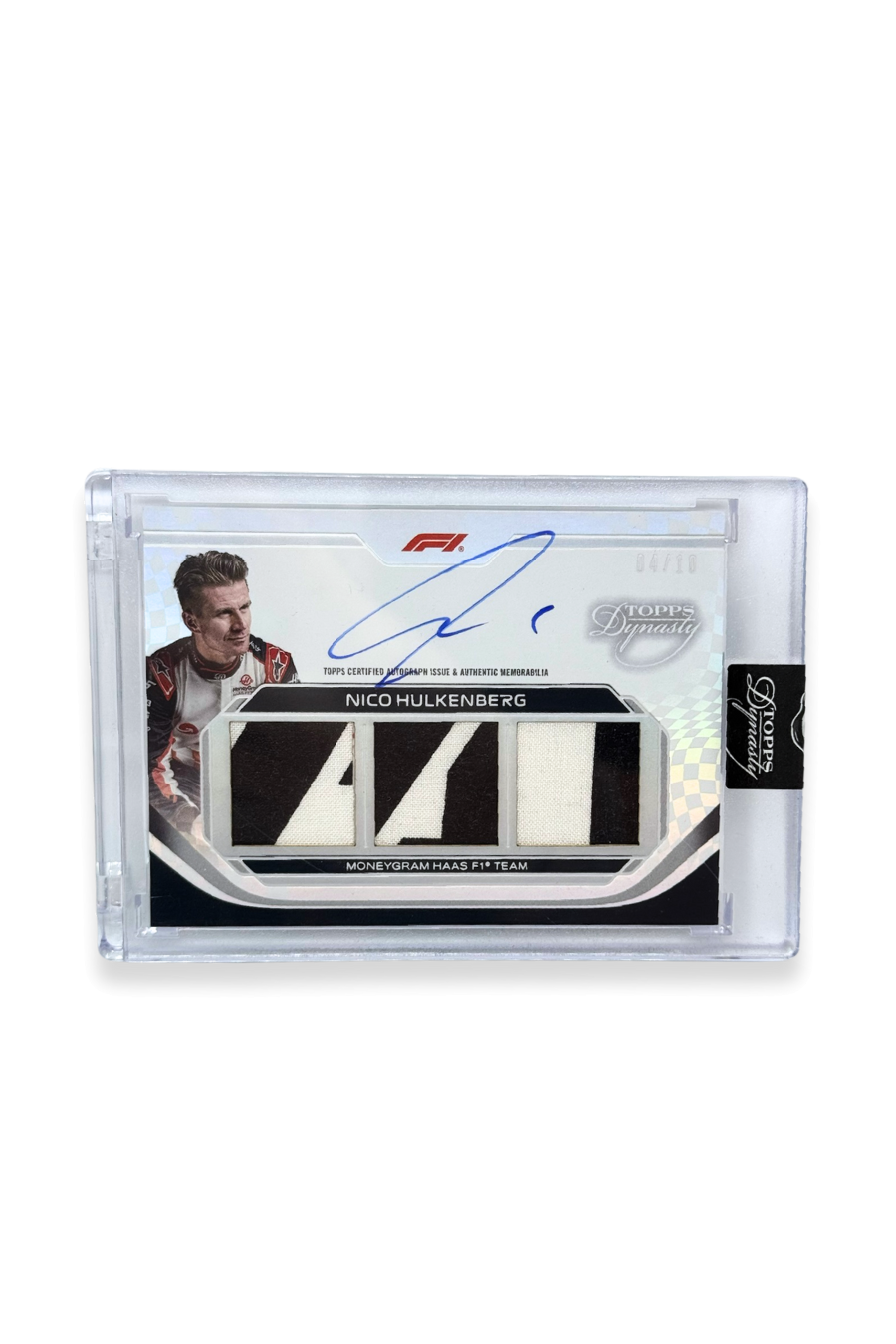 Front of 2024 Topps Dynasty Nico Hülkenberg triple patch autograph card, serial numbered 4 of 10, showing black and white memorabilia patches.