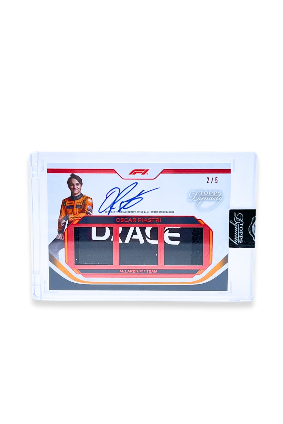 Front of 2024 Topps Dynasty Oscar Piastri triple patch autograph card, serial numbered 2 of 5, featuring an authentic triple memorabilia patch with lettering detail.