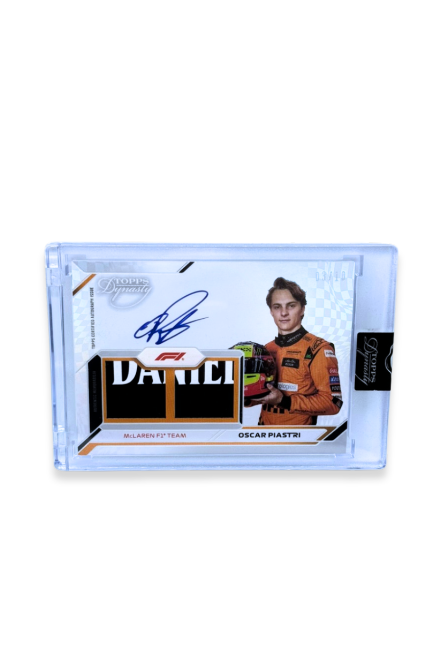 Front of 2024 Topps Dynasty Oscar Piastri Nameplate Patch Auto card, serial numbered #3/10, featuring black patch and autograph