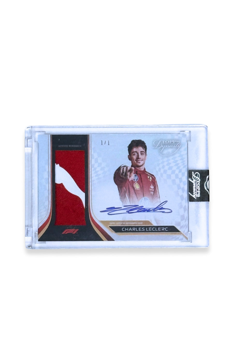 Front of 2024 Topps Dynasty Charles Leclerc patch autograph card, 1 of 1, with red Puma memorabilia patch and Leclerc’s signature.