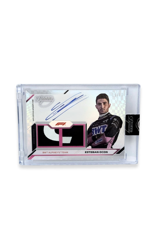 Front of 2024 Topps Dynasty Esteban Ocon double patch autograph card, serial numbered 5 of 10, showing black and white memorabilia patches.