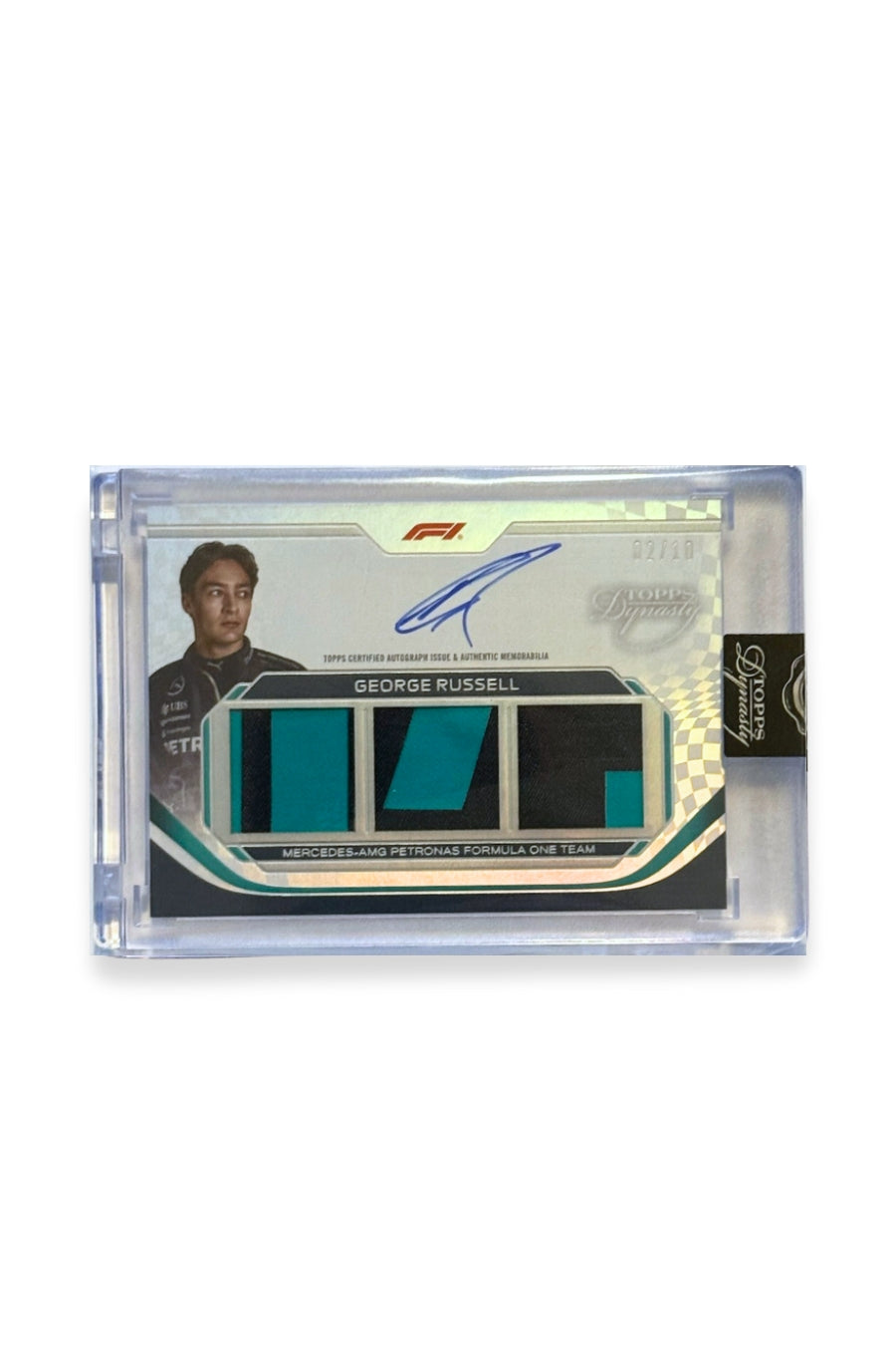 Front of 2024 Topps Dynasty George Russell triple patch autograph card, serial numbered 2 of 10, showing teal and black memorabilia patches.