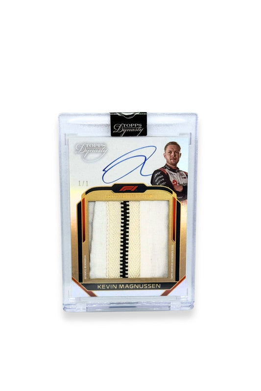 Front of 2024 Topps Dynasty Kevin Magnussen jumbo zipper patch autograph card, serial numbered 1 of 1,  black zipper memorabilia.
