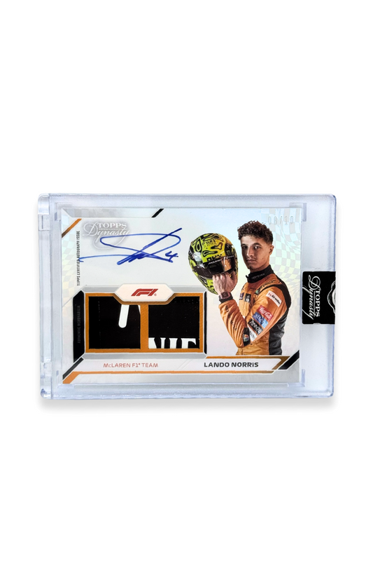Front of 2024 Topps Dynasty Lando Norris double patch autograph card, serial numbered 8 of 10, showing black and white memorabilia patches.