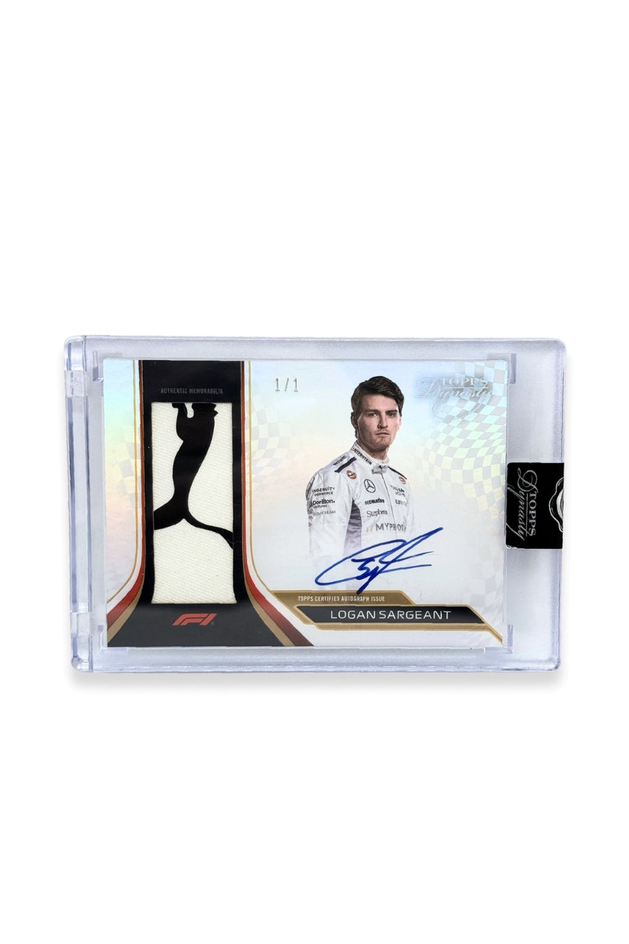 Front of 2024 Topps Dynasty Logan Sargeant patch autograph card, serial numbered 1 of 1, featuring an authentic black and white Puma logo memorabilia patch.
