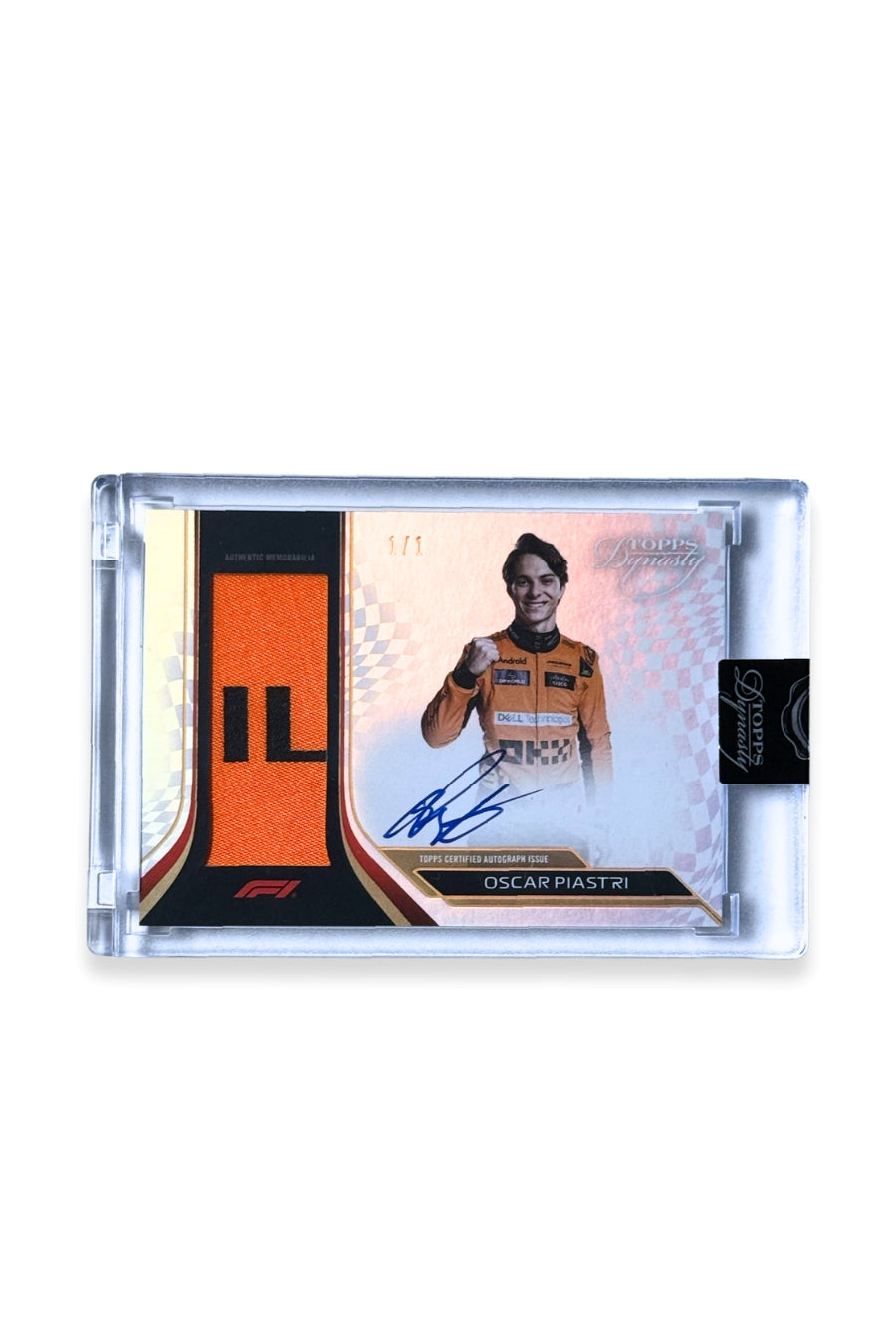 Front of 2024 Topps Dynasty Oscar Piastri patch autograph card, serial numbered 1 of 1, with orange and black memorabilia patch.