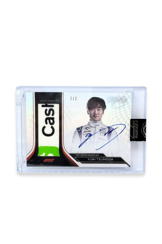 Front of 2024 Topps Dynasty Yuki Tsunoda patch autograph card, serial numbered 2 of 2, featuring a white and green authentic memorabilia patch with Cash App logo from Visa Cash App RB Formula One Team.