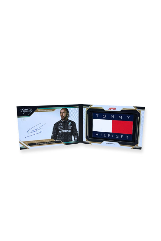 Open booklet view of 2024 Topps Dynasty Lewis Hamilton 1/1 card with autograph and jumbo Tommy Hilfiger patch.