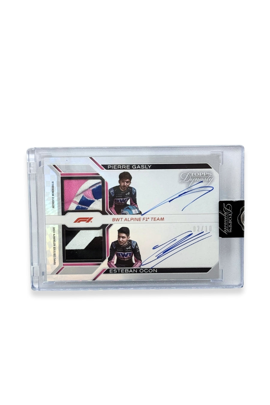 Front of 2024 Topps Dynasty Valtteri Bottas triple patch autograph card, serial numbered 2 of 5, featuring three bright green authentic memorabilia patches from Stake F1 Team Kick Sauber.