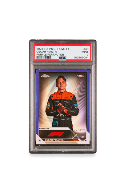 Front of 2023 Topps Chrome F1 Oscar Piastri Purple Refractor rookie card #71, graded PSA 9. Features Piastri in his McLaren race suit with vibrant purple refractor detailing and Topps Chrome and RC logos. Serial numbered 92/399.