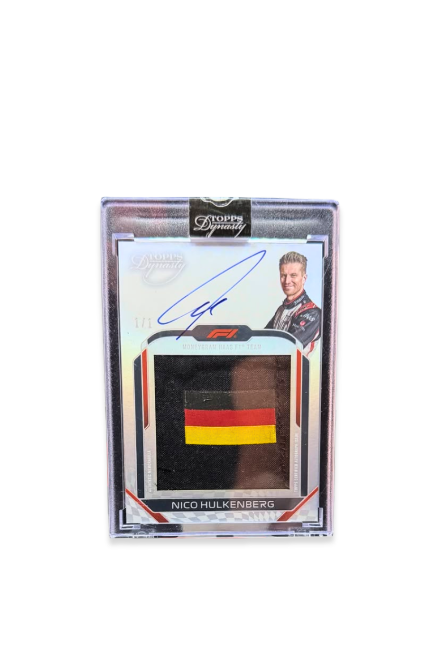 Front of 2024 Topps Dynasty Nico Hülkenberg patch autograph card, serial numbered 1 of 1, with full German flag memorabilia patch.
