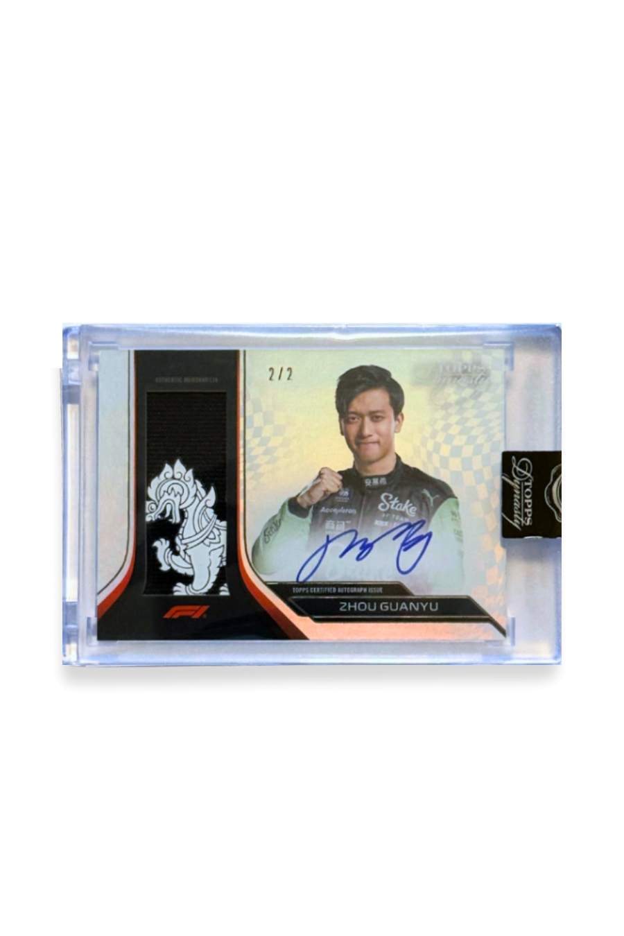 Front of 2024 Topps Dynasty Zhou Guanyu patch autograph card, serial numbered 2 of 2, with a printed dragon motif on a black patch and on-card signature.