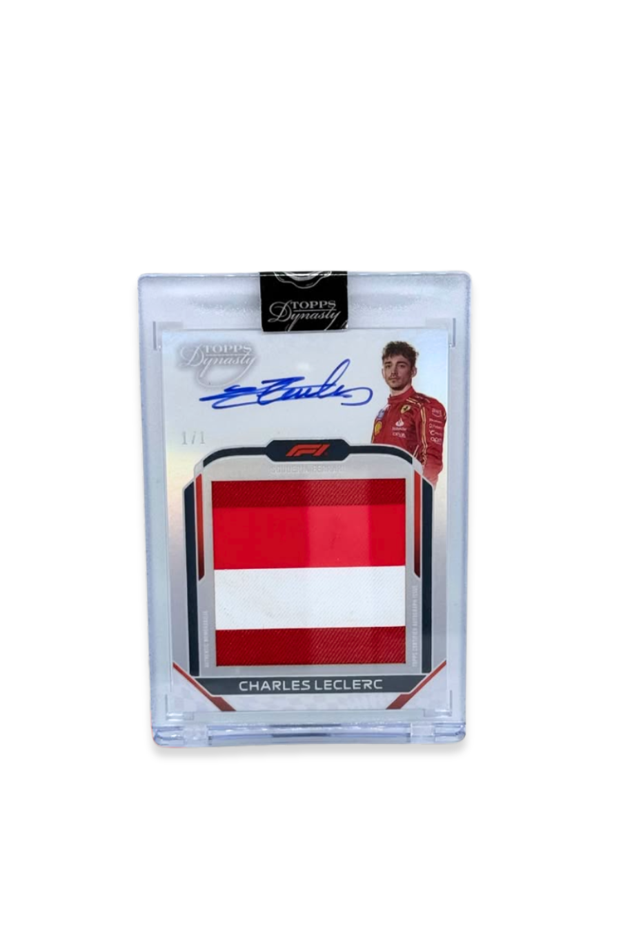 Front of 2024 Topps Dynasty Charles Leclerc patch autograph card, serial numbered 1 of 1, with red and white horizontal fabric patch and on-card signature. monaco