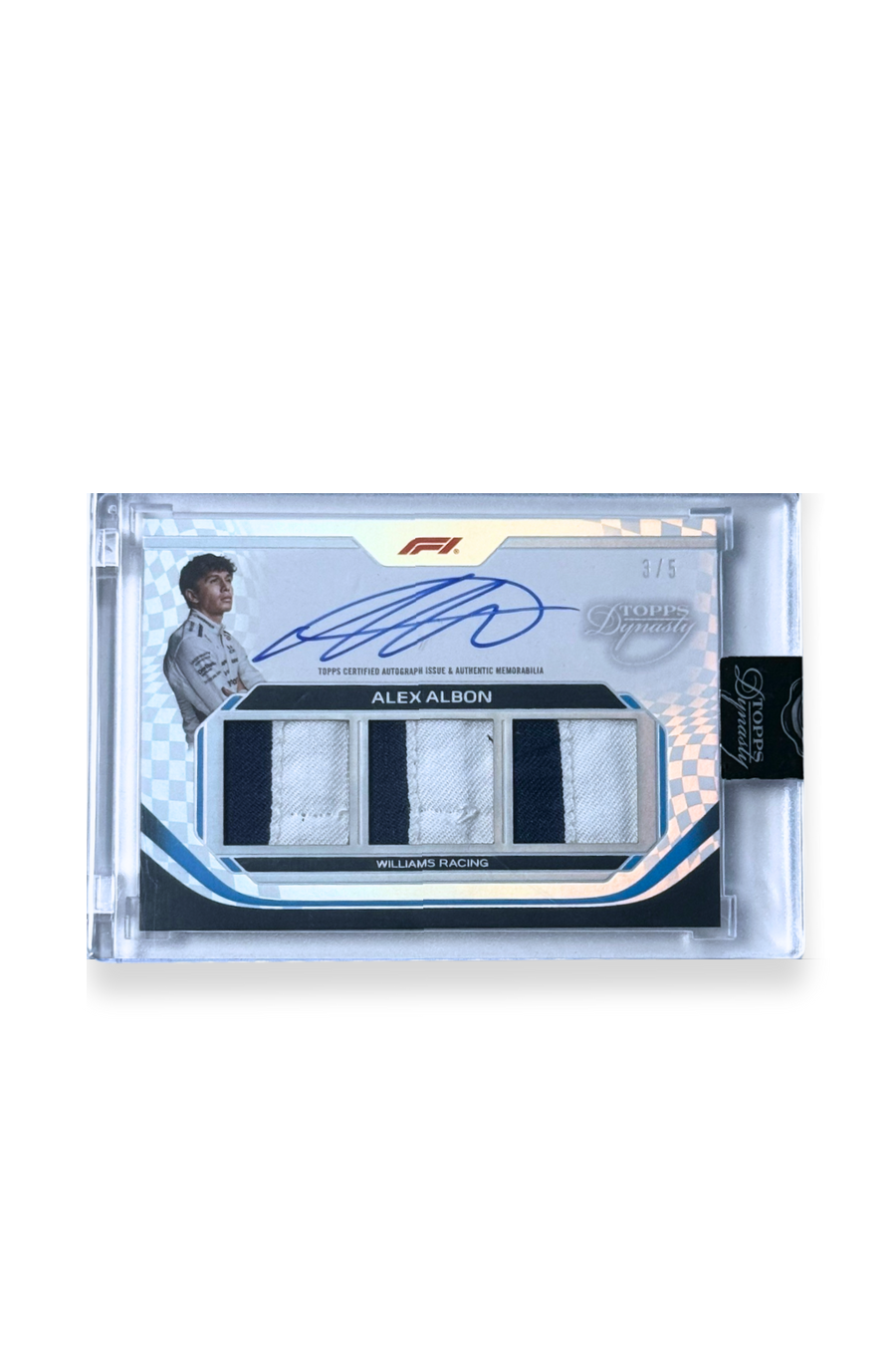 Front of 2024 Topps Dynasty Alex Albon Triple Patch Auto card, serial numbered 3/5, featuring vertical navy and white patches and autograph