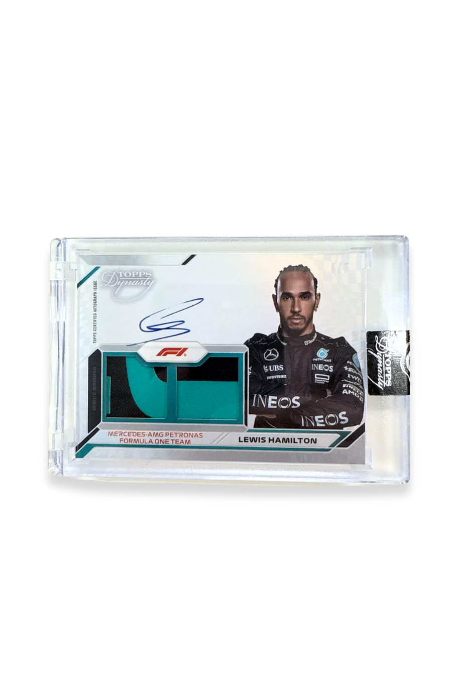 Front of 2024 Topps Dynasty Lewis Hamilton dual patch autograph card, featuring teal and black memorabilia patches. 4/5