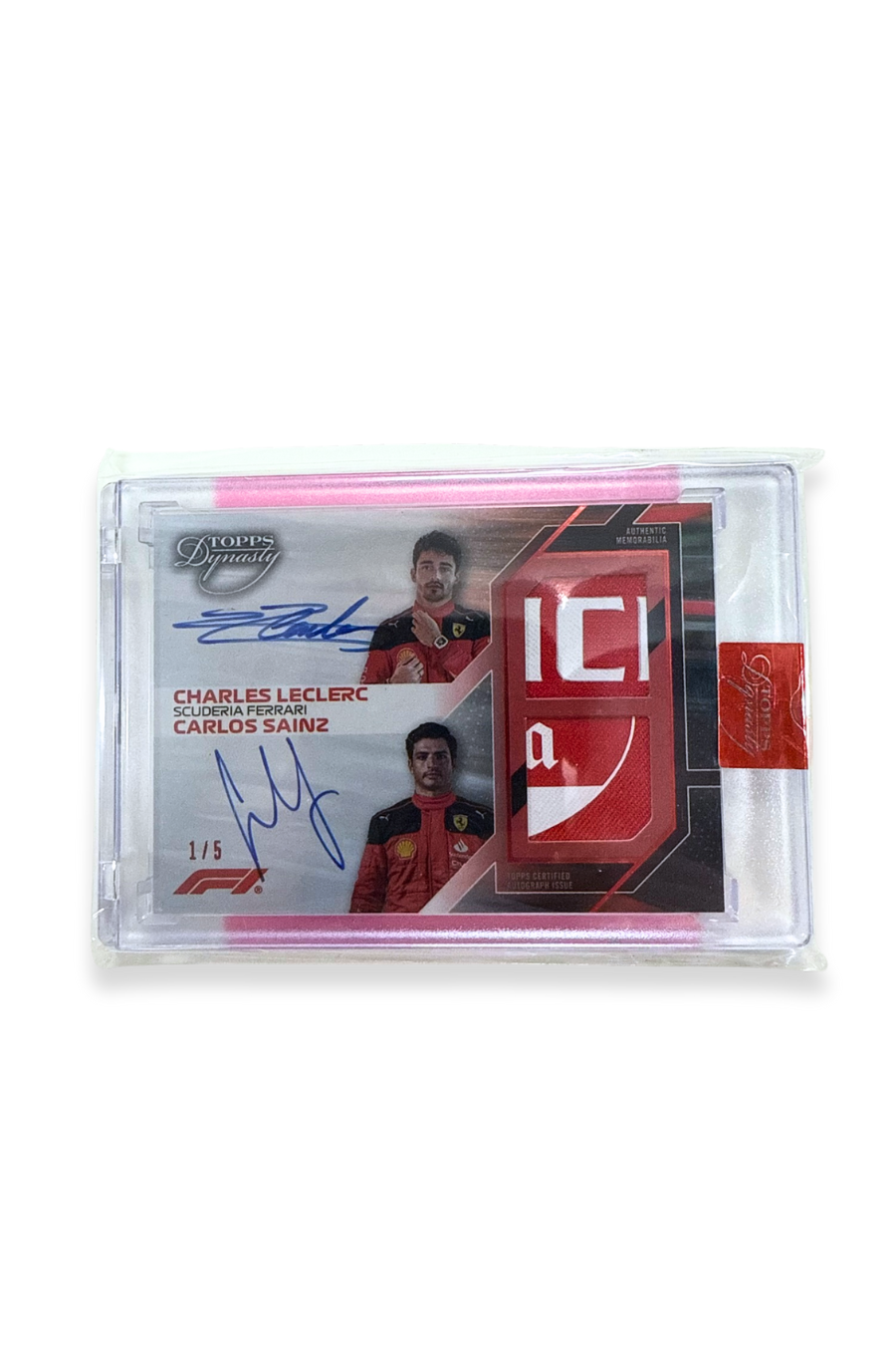 ront of 2023 Topps Dynasty Charles Leclerc & Carlos Sainz dual patch autograph card, serial numbered 1 of 5, featuring bold red and white memorabilia patch.