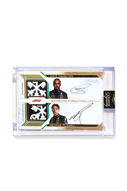 Front of 2024 Topps Dynasty Lewis Hamilton and George Russell dual patch autograph card, serial numbered 1 of 1, showing Mercedes star patches and dual autographs.