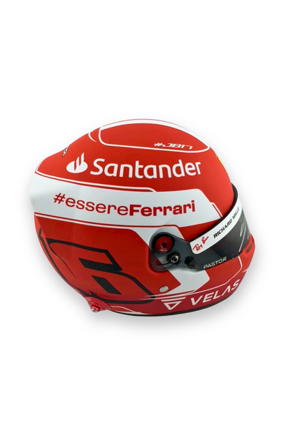 Side view of Charles Leclerc 2022 Ferrari helmet with Santander and #essereFerrari sponsors.