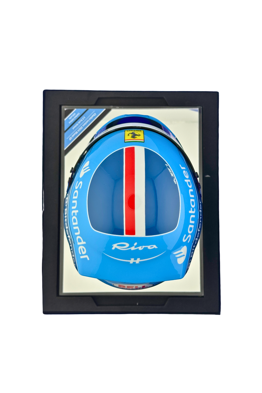 Top view of Charles Leclerc 2024 Miami GP Bell helmet, showing blue livery and Ferrari crest.