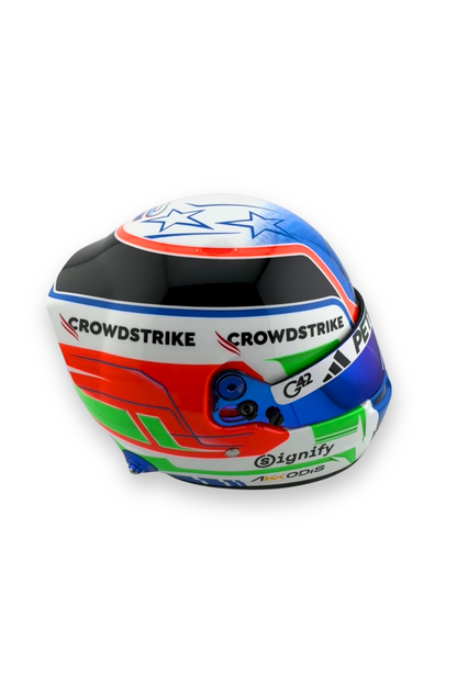 Alternate side profile of Kimi Antonelli Mercedes helmet showing PETRONAS and sponsor logos.