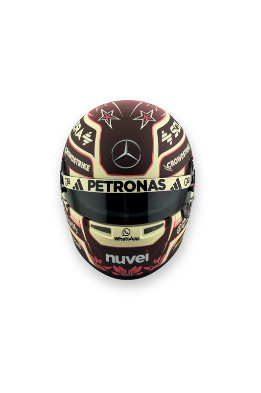 Front view of Kimi Antonelli 2024 Mercedes F1 Bell helmet, featuring Petronas and Nuvei sponsor logos.