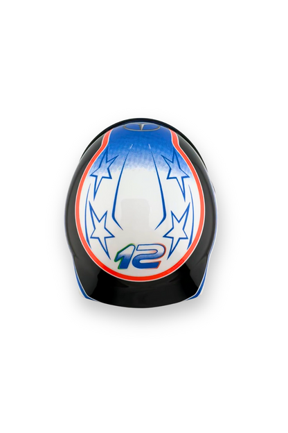 Top-down view of Kimi Antonelli Mercedes helmet with star design and number 12 graphic.