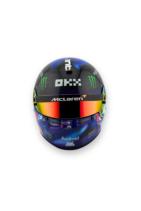 Front view of Lando Norris 2024 Singapore GP winner Bell 1:2 helmet with McLaren logo and orange reflective visor.