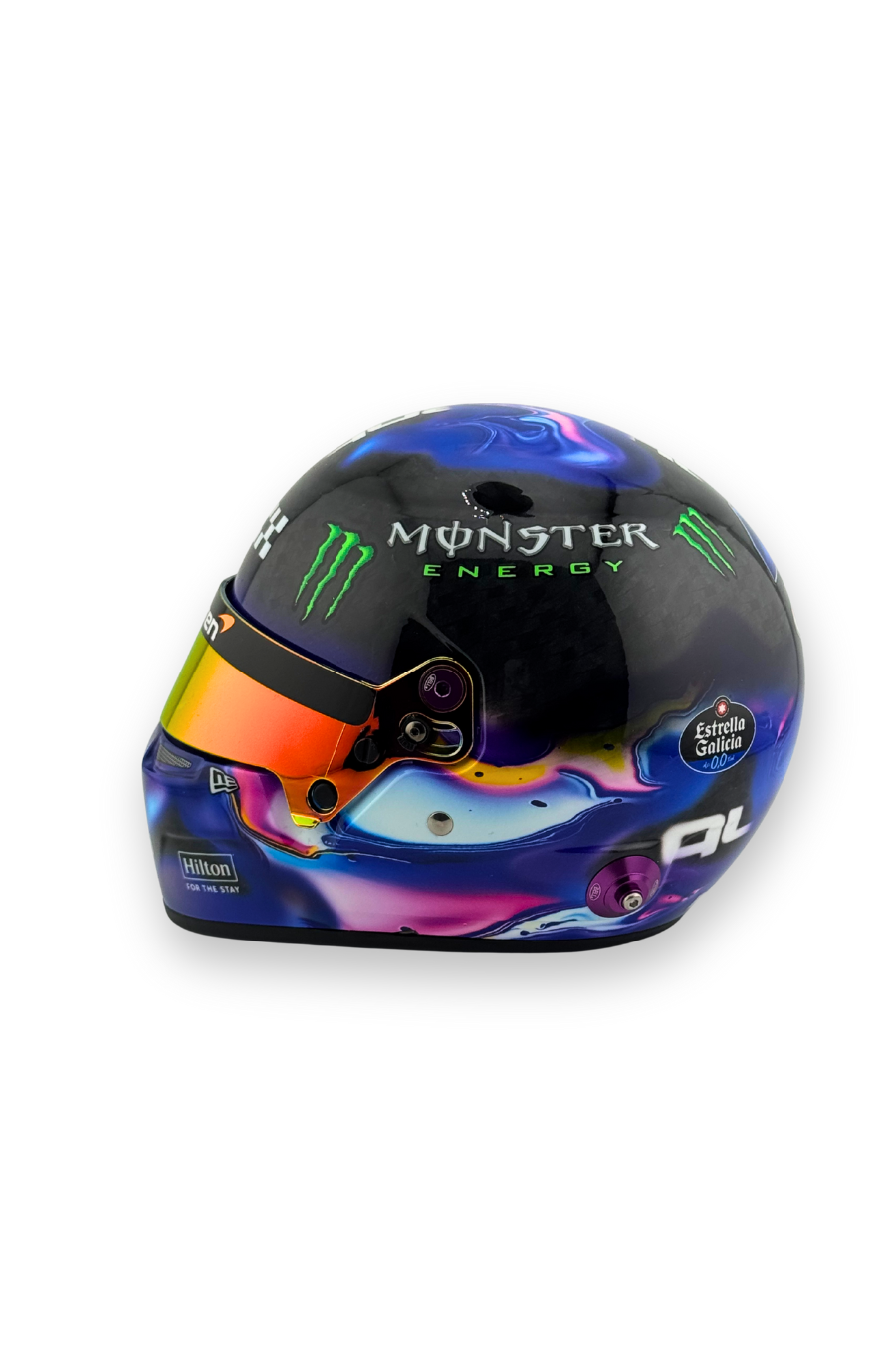 Left-side view of Lando Norris 2024 Singapore winner helmet showing Huski, Android, and other sponsor branding.