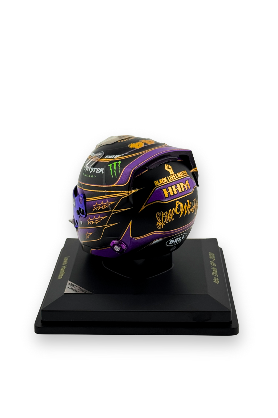 Rear view of Lewis Hamilton 2020 Abu Dhabi GP Spark helmet showing Black Lives Matter fist and “Still We Rise” message.