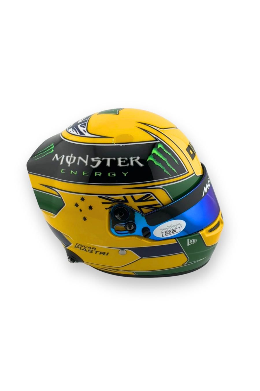 Right side view of Oscar Piastri 1:2 scale Bell helmet in yellow and green Senna-inspired design.