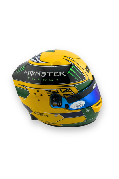 Right side view of Oscar Piastri 1:2 scale Bell helmet in yellow and green Senna-inspired design.