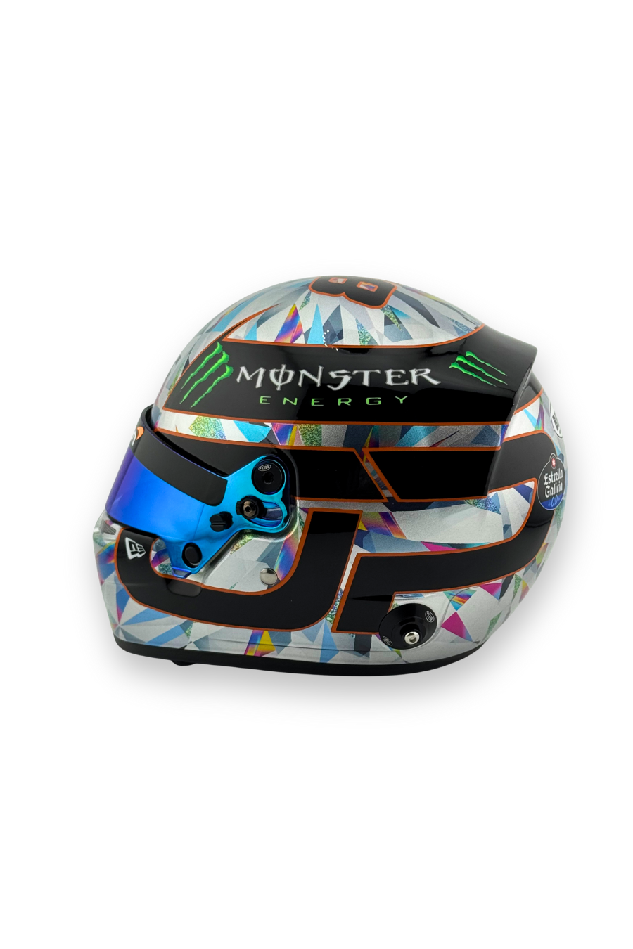 Left side of Oscar Piastri 2024 Singapore GP Bell 1:2 helmet with Monster Energy branding and chrome geometric design.