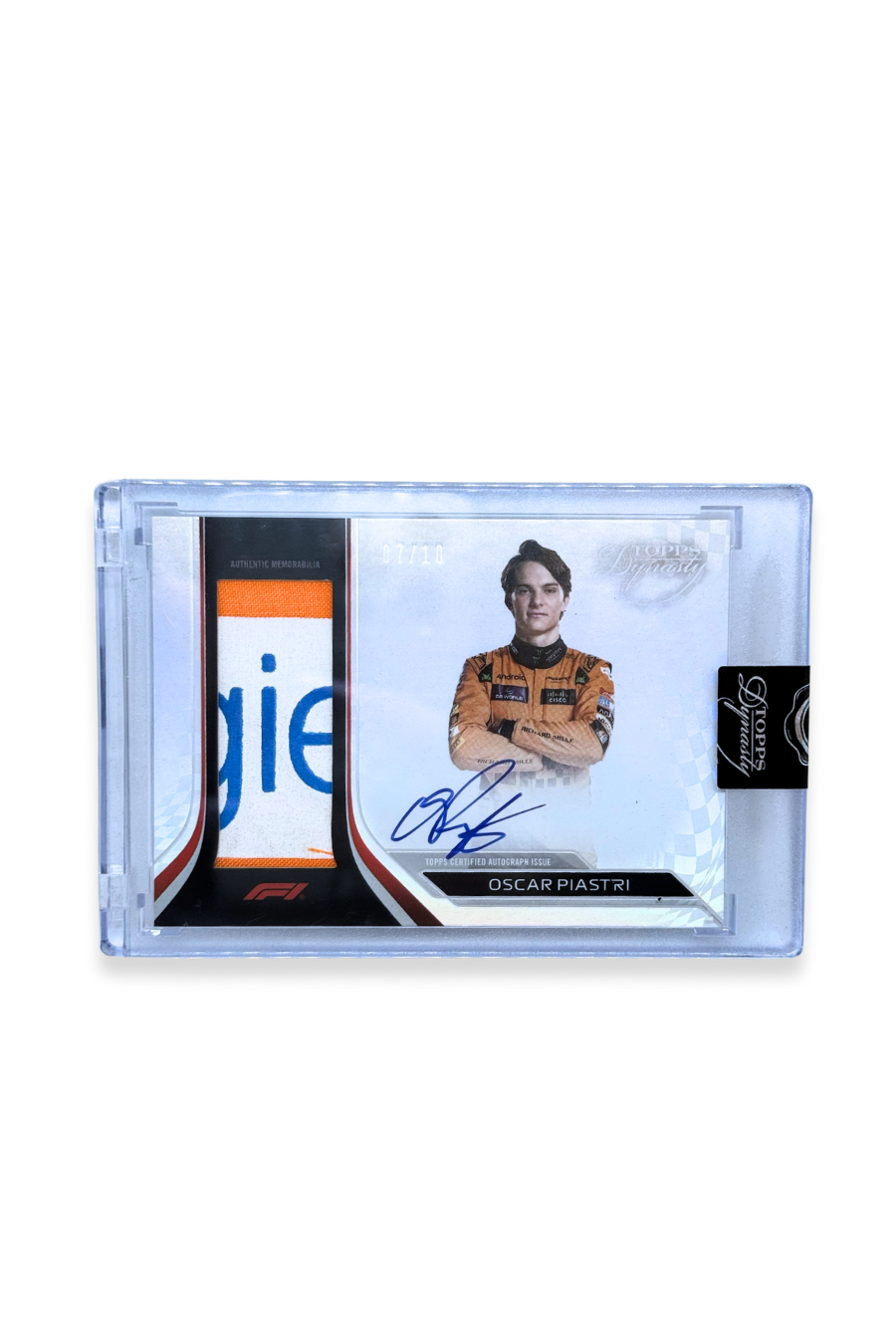 2024 Topps Dynasty Oscar Piastri McLaren F1 patch autograph card with orange and blue patch, signed, serial numbered 07/10